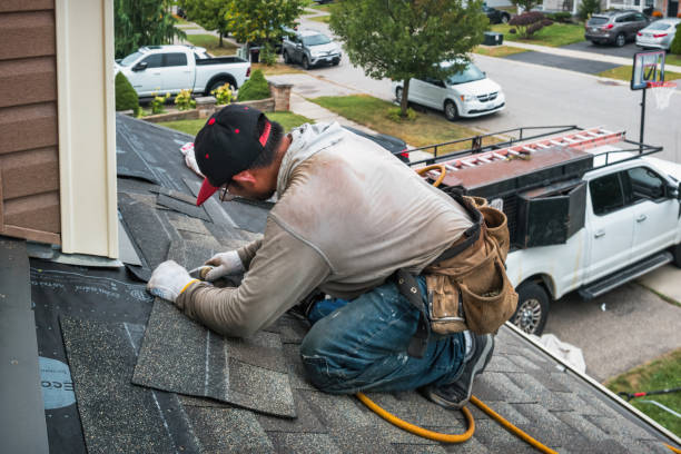 Professional Roofing technician working in Freeville, NY